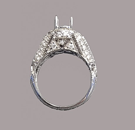 Diamond engagement ring semi mount for a round diamond