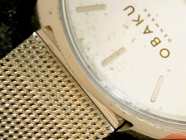 ladies silver band silver face
