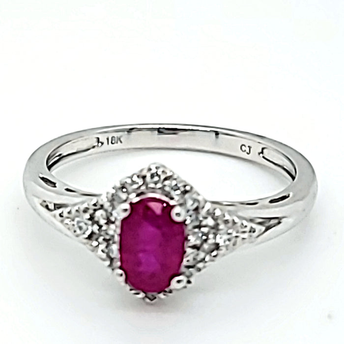 18kw oval ruby and diamond rin