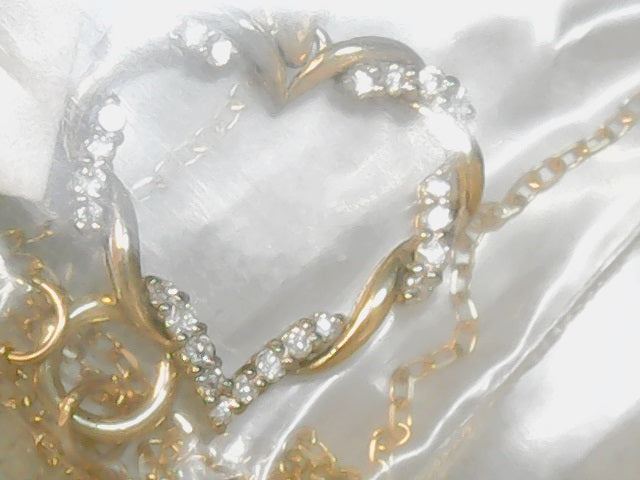 10ktyellow diamond twist heart